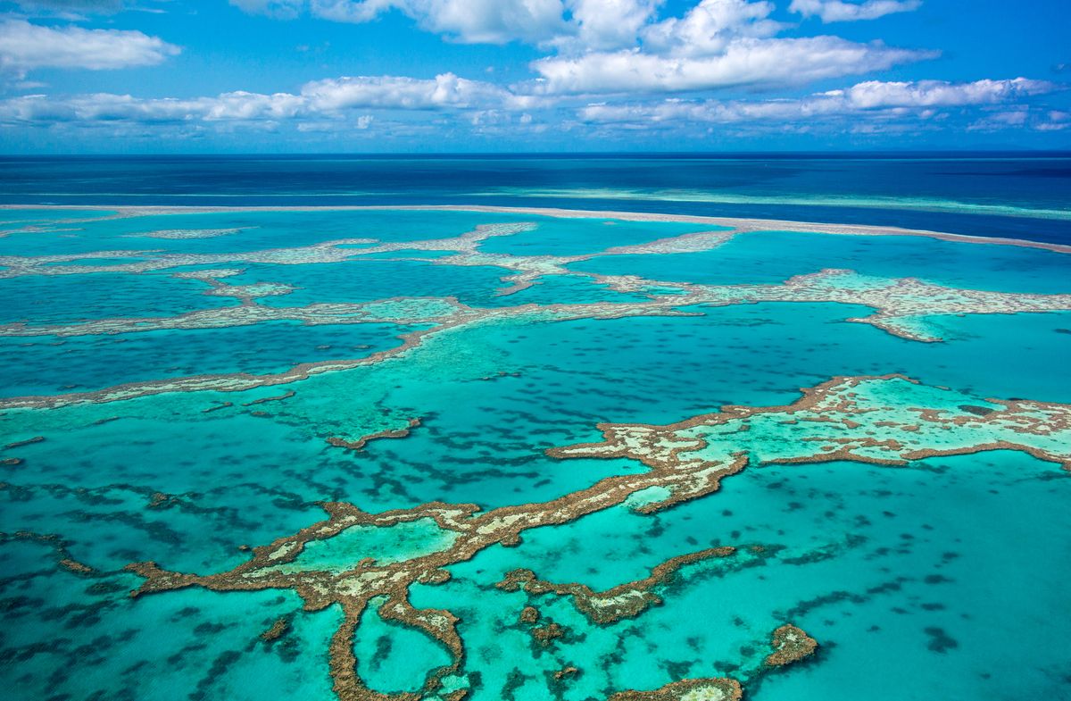 aerial-of-great-barrier-reef-at-whitsunday-island-royalty-free-image-158714547-1540478477.jpg